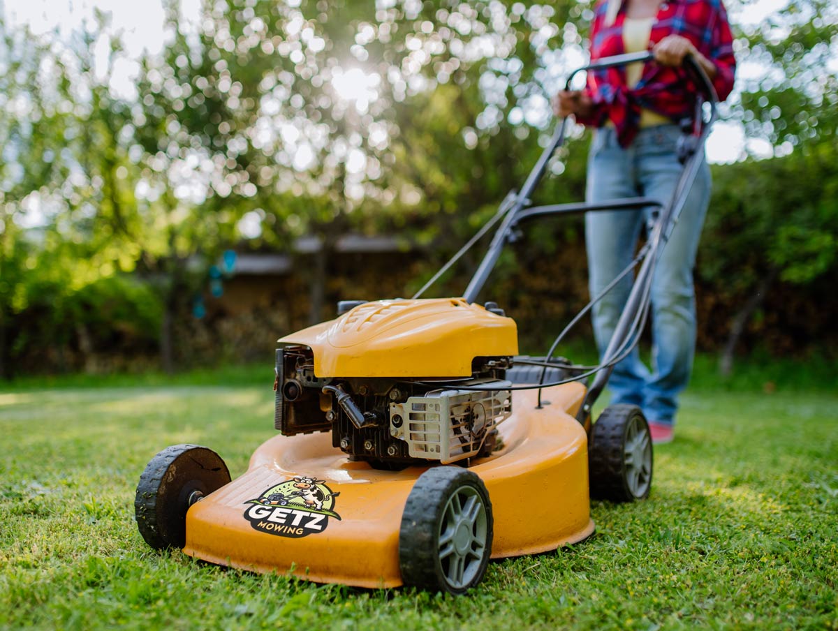 Mowing backyard